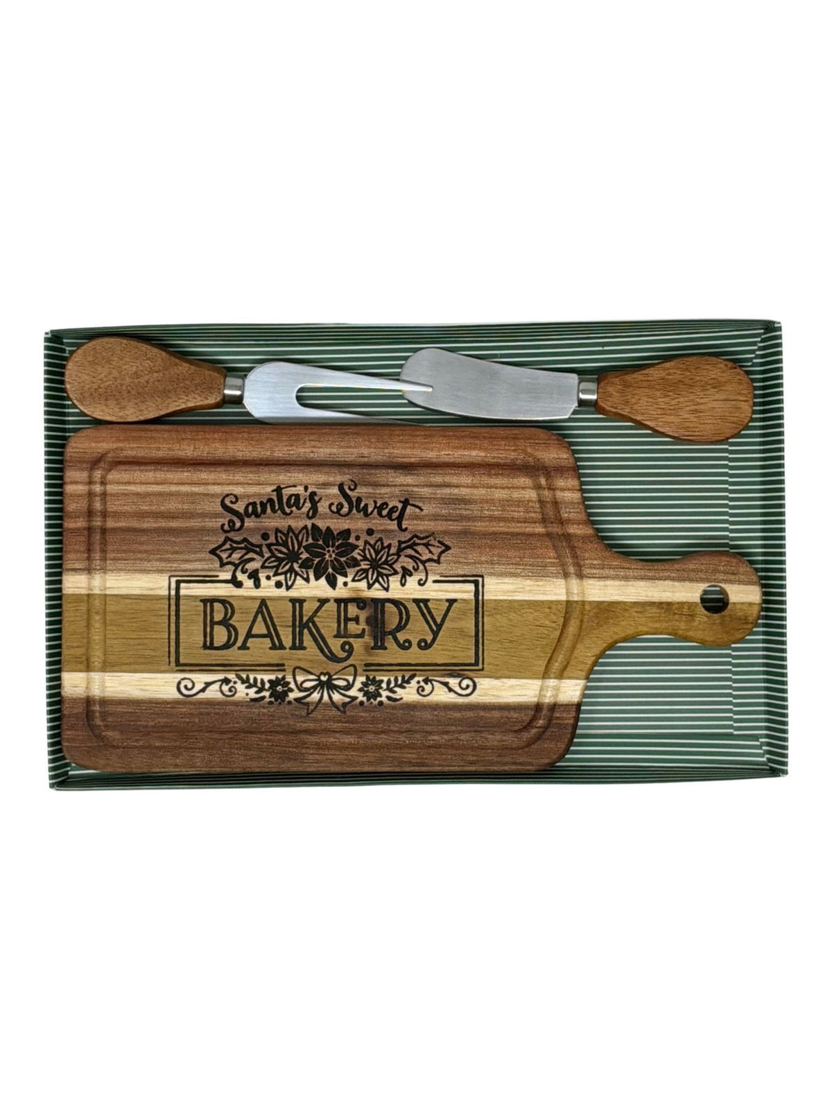 Hand-burned Santa's Sweet Bakery cheeseboard with wood-handled cheese knife and fork in a green striped gift box