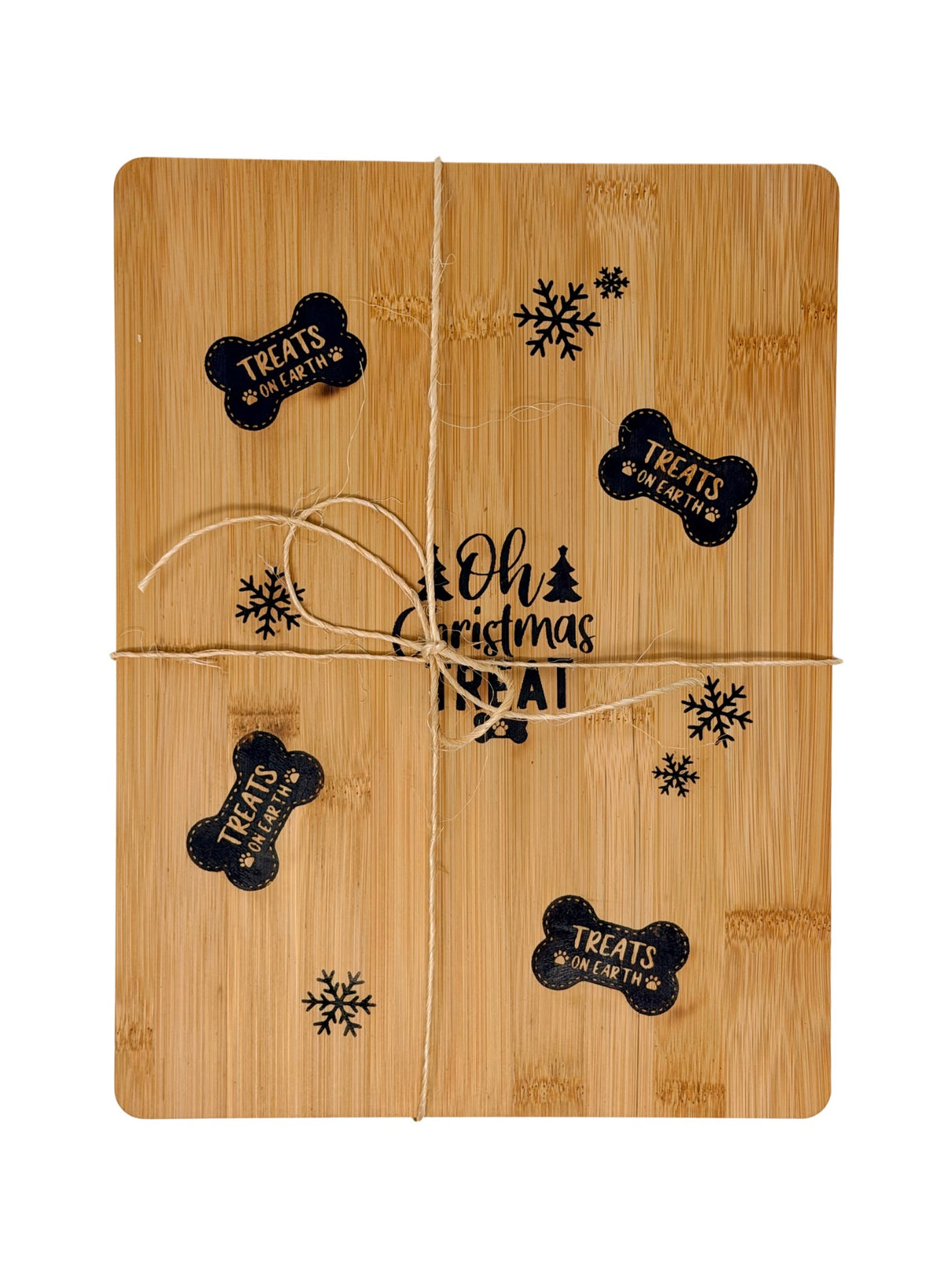 Oh Christmas Treat cutting board tied with twine