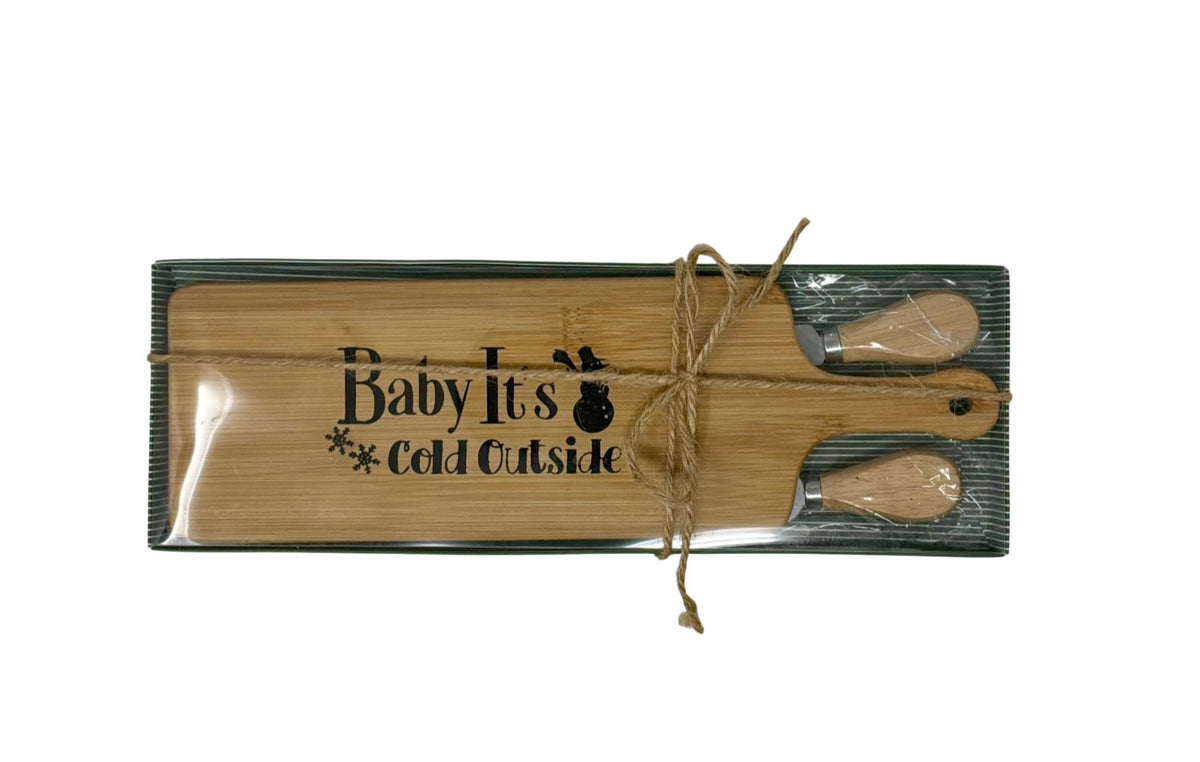 Baby It's Cold Outside cheese board gift set tied with twine, ready to give