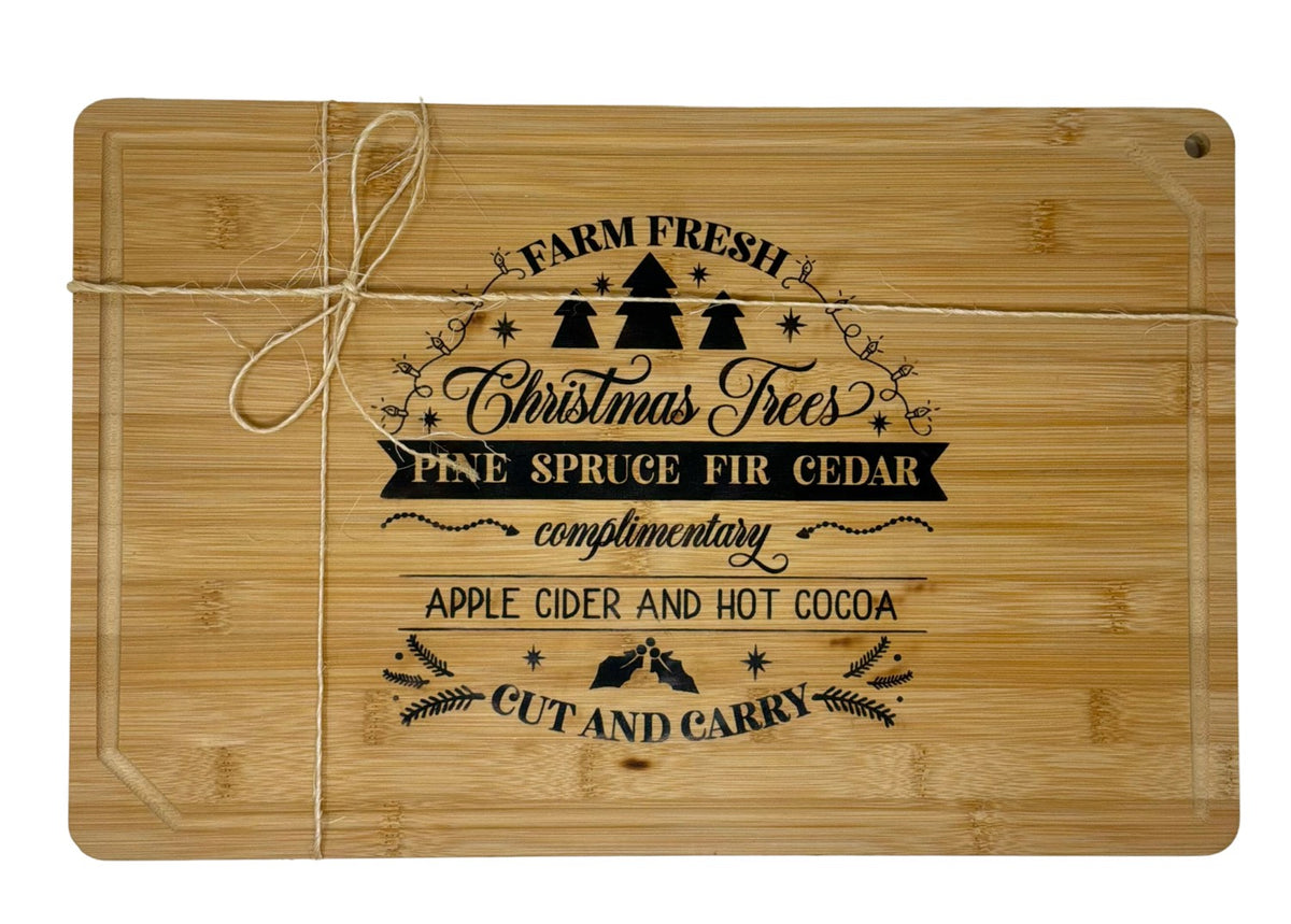 Large Farm Fresh Christmas Trees cutting board tied with twine