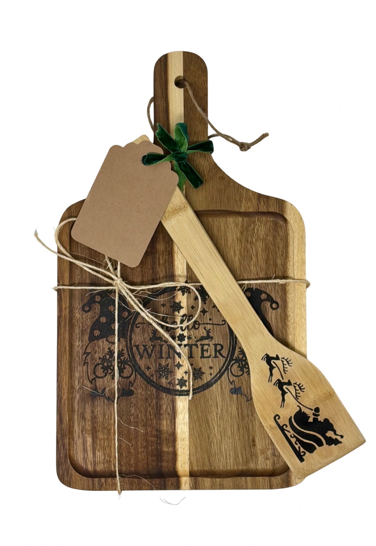 Sample of the holiday gift package with decorative ribbon and gift tag on a board