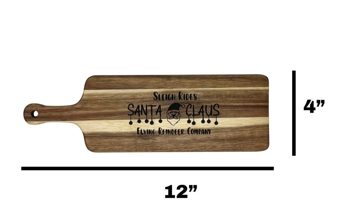 Sleigh Rides Santa Claus cheese board measuring 12 inches long by 4 inches wide