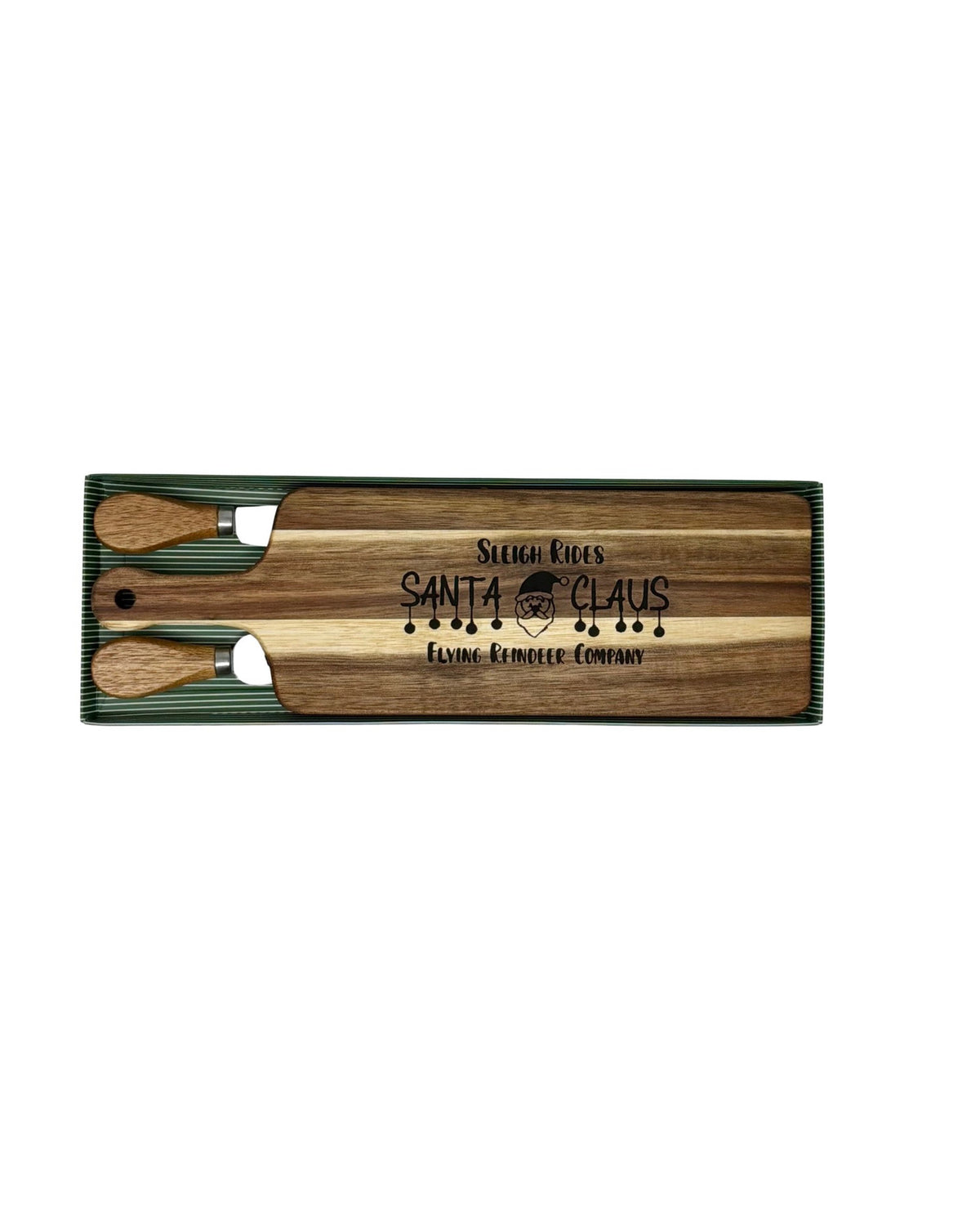 Sleigh Rides Santa Claus cheese board with wood-handled cheese fork and spreader in a green striped gift box