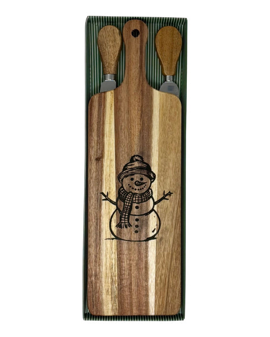 Snowman long cheese board with wood-handled cheese fork and spreader in a green striped gift box